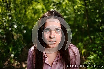 Portrait of attractive young indecisive shy woman face close up Stock Photo