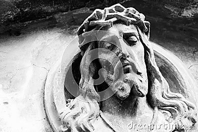 Face of Jesus Christ on a tomb Stock Photo