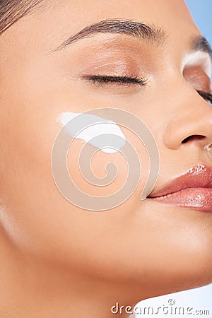 Face makeup, cream and studio woman with skin cosmetics, anti aging glow and closeup facial hydration creme. Collagen Stock Photo