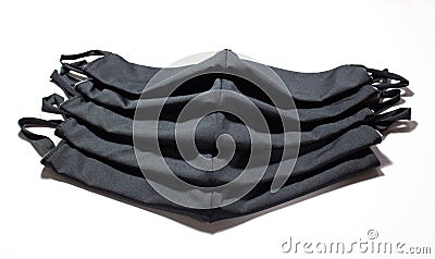 Face mask in black. Five masks to personal wear. White background. It avoids contagious disease Stock Photo