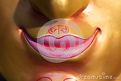 Face mask of Thai god, smile Stock Photo
