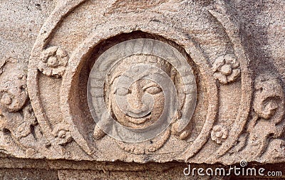 Face of one of the Hindu gods of temple, India. Example of Indian architecture in Pattadakal, UNESCO World Heritage site Stock Photo