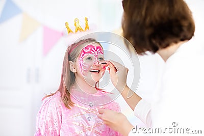 Face painting for little girl birthday party Stock Photo