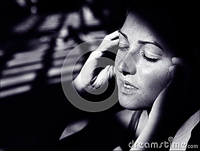 Face portrait with deep emotions and smile, black and white monochrome, art genre portrait with light and shadows in old film Stock Photo