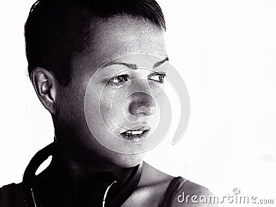 Face portrait with deep emotions and smile, black and white monochrome, art genre portrait with light and shadows in old film Stock Photo
