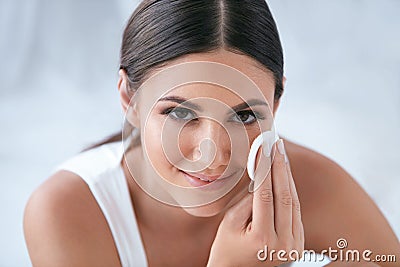 Face Skin Care. Beautiful Woman Removing Makeup With Cotton Pad Stock Photo