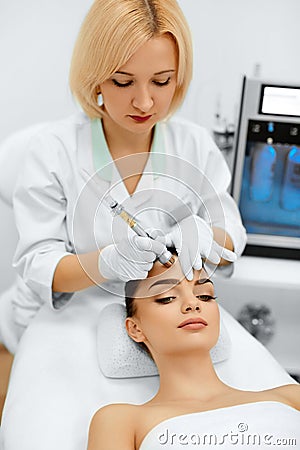 Face Skin Care. Diamond Microdermabrasion Peeling Treatment, Beauty Spa. Cosmetology. Stock Photo