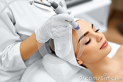 Face Skin Care. Facial Hydro Microdermabrasion Peeling Treatment Stock Photo