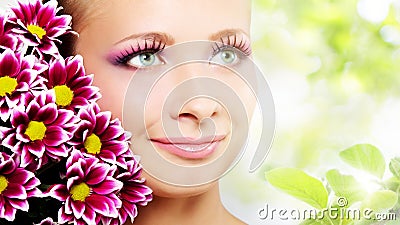 Face of woman with chrysanthemum Stock Photo