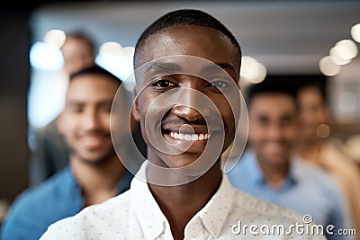 Face it, you were born to lead. Portrait of a group of confident young businesspeople working together in a modern Stock Photo