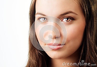 Face of young woman with beautiful bright eyes Stock Photo