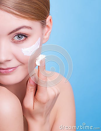 Face of young woman girl taking care of dry skin. Stock Photo