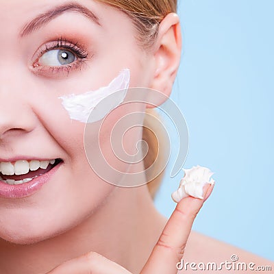 Face of young woman girl taking care of dry skin. Stock Photo