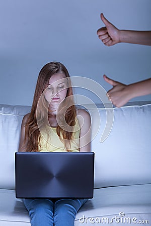 Facebook girl using notebook Stock Photo