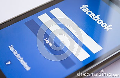 Facebook log-in on smart phone Editorial Stock Photo