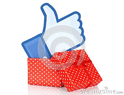 Facebook thumbs up sign into present box Editorial Stock Photo