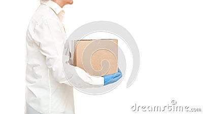 Faceless deliveryman hands in sterile gloves courier for safe delivery. Stock Photo