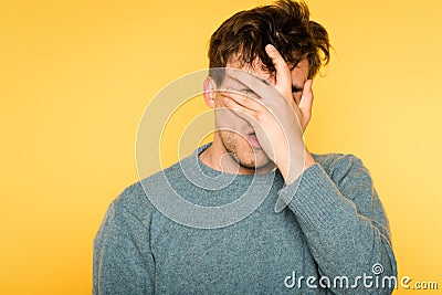 Facepalm desperate frustrated man cover hangover Stock Photo