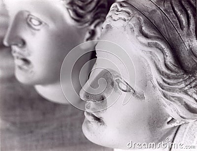 The faces of 2 female statues Stock Photo