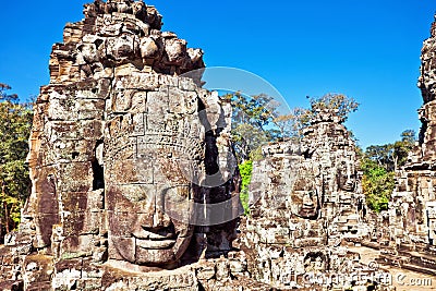 Faces of ancient Bayon Temple At Angkor Wat Stock Photo