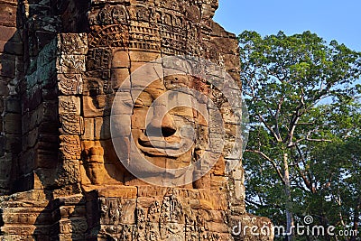 Faces of ancient Bayon Temple in Siem reap Stock Photo