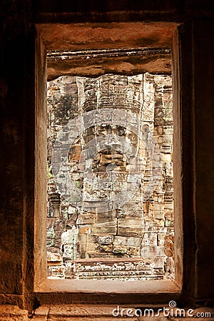 Faces in Bayon Temple at sunset, Angkor Wat Stock Photo