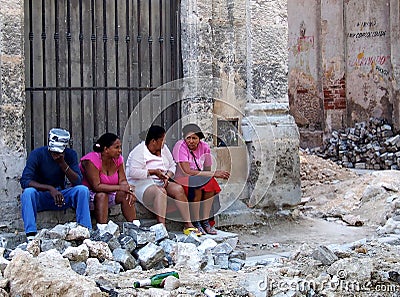 Faces Of Cuba-People Resting In Doorway Editorial Stock Photo