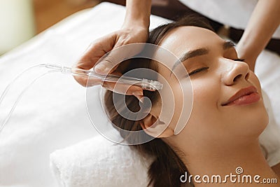 Facial Beauty Treatment. Woman Getting Oxygen Water Skin Peeling Stock Photo