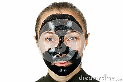 Facial black mask Stock Photo