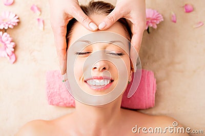 Facial massage at spa Stock Photo