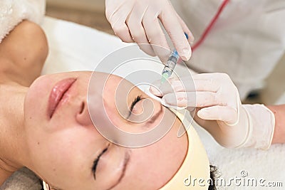 Facial mesotherapy syringe face Stock Photo