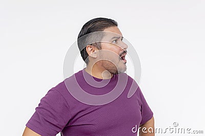 Facial reaction of a middle aged man realizing he has been bamboozled and scammed. Side view shot Isolated on a white background Stock Photo