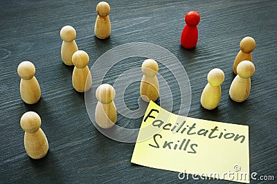 Facilitation skills concept. Wooden figurines as symbol of teamwork Stock Photo