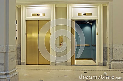 Facing elevators Stock Photo