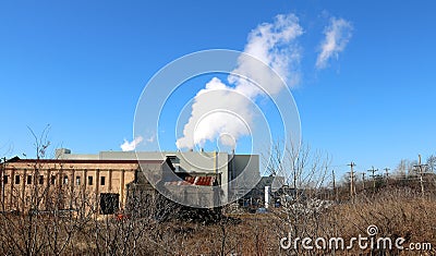 Factory Bellowing Smoke Stock Photo