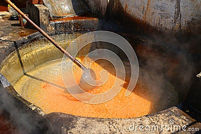 Factory boiling sugar cane. Stock Photo