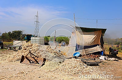 Factory boiling sugar cane. Stock Photo