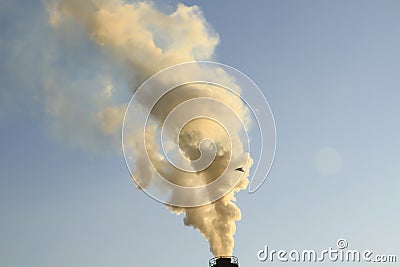 Factory chimney smoking, heavy black smoke on the sky. ecology problems Stock Photo