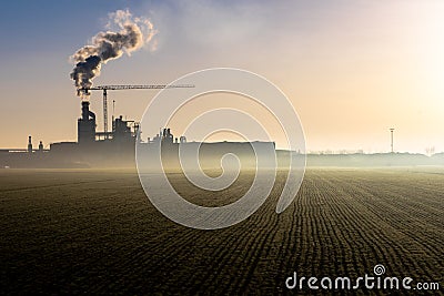 a factory heavily pollutes the air Stock Photo