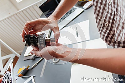 The factory mechanical engineering team is designing and developing gear sets to keep the machines running perfectly because gear Stock Photo