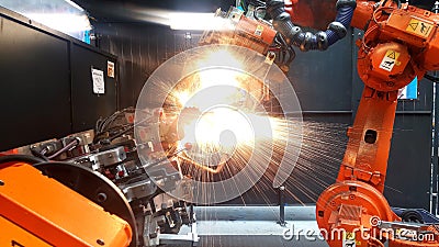 Factory using robotics to make car parts Stock Photo