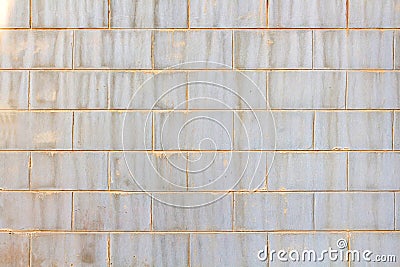 Factory wall made of stone block,wall plant creem color Stock Photo
