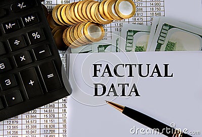 FACTUAL DATA - words on a white sheet on the background of a calculator, coins and dollar bills Stock Photo