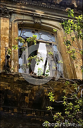 Faded glory, window of roofless mansion Stock Photo