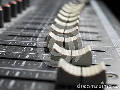 Faders on the mixing desk Stock Photo