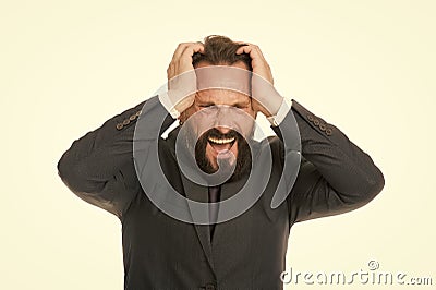 Failed again. Frustrated business man hold hands on head and keep eyes closed while stand against white background Stock Photo