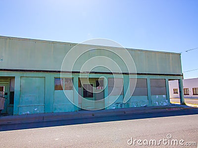 Failed Business Store Front With Boarded Up Windows Stock Photo