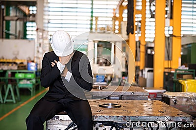 Failed businessman cry in factory Stock Photo