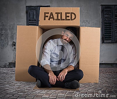 Failed businessman on the street Stock Photo