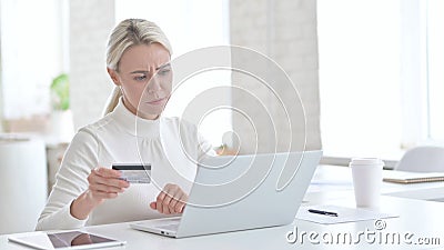 Failure Young Businesswoman using Credit on Laptop Stock Photo